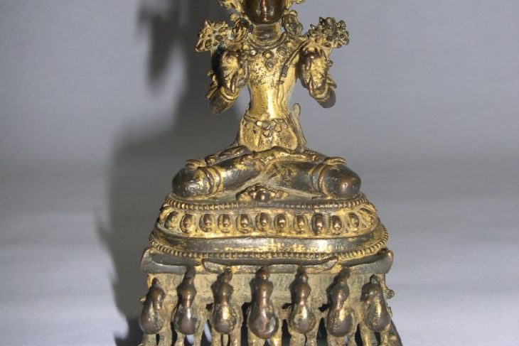 Candra  seated in chariot throne of 7 peacocks