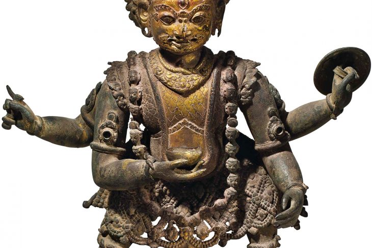 A GILT COPPER REPOUSSE FIGURE OF BHAIRAVA