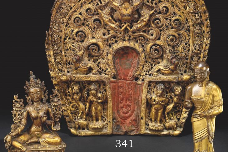 A GILT-COPPER REPOUSSE HALO