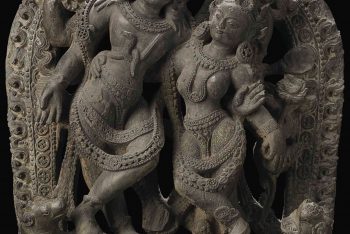A black stone stele with Shiva and Parvati