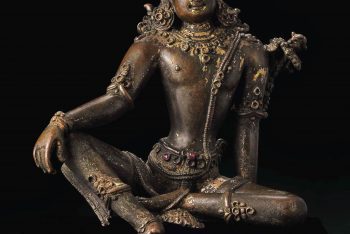 A bronze figure of Indra