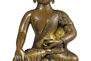 A copper figure of Buddha