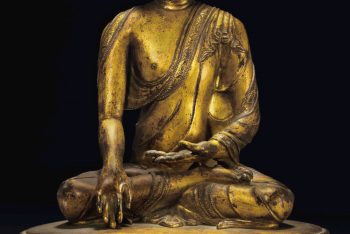 A gilt bronze figure of Buddha