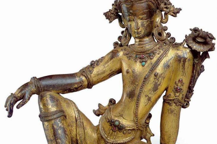 A gilt bronze figure of Indra