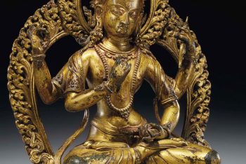 A gilt bronze figure of Manjushri