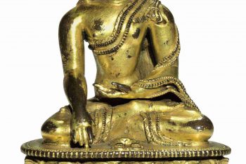 A gilt bronze figure of Shakyamuni