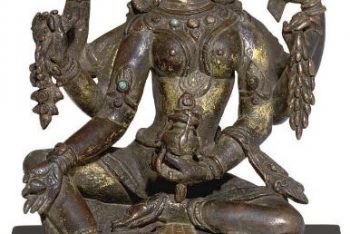 A gilt bronze figure of Vasudhara