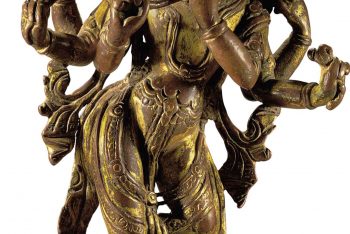 A gilt copper figure of Krishna