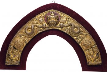 A gilt copper repousse mandorla