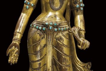 A hardstone inlaid gilt bronze figure of Tara