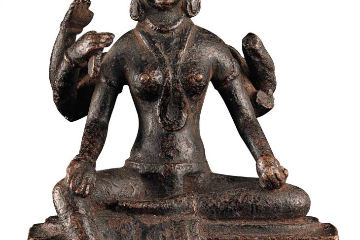 An early and rare bronze figure of Vasudhara