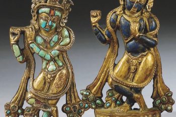 TWO TURQUOISE AND LAPIS-LAZULI INLAID REPOUSSE GILT-COPPER ORNAMENTS DEPICTING VENUGOPALA