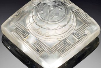A CARVED ROCK CRYSTAL YANTRA