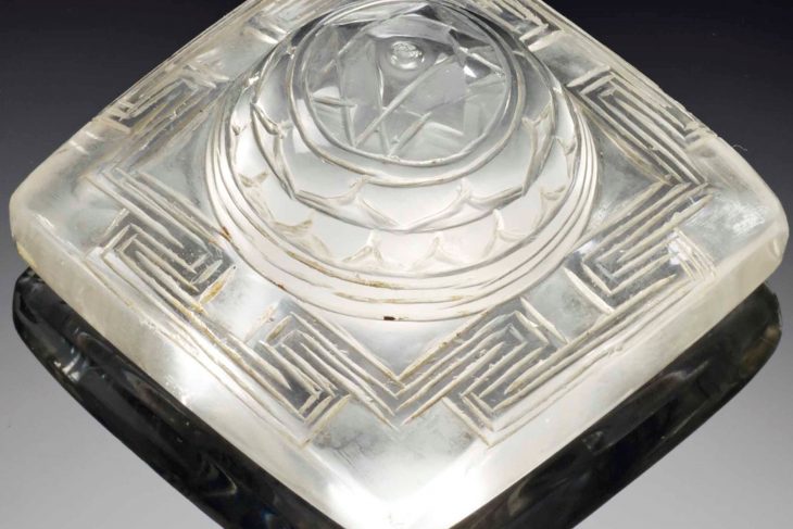 A CARVED ROCK CRYSTAL YANTRA