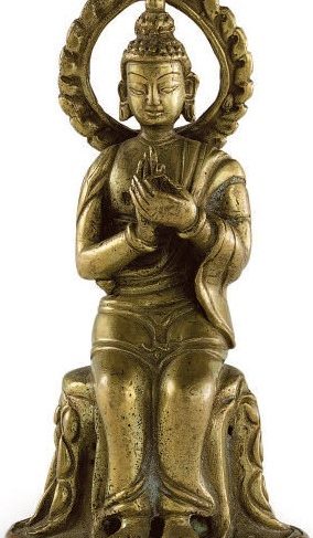 A SMALL INDIAN GILT COPPER FIGURE OF THE TEACHING BUDDHA