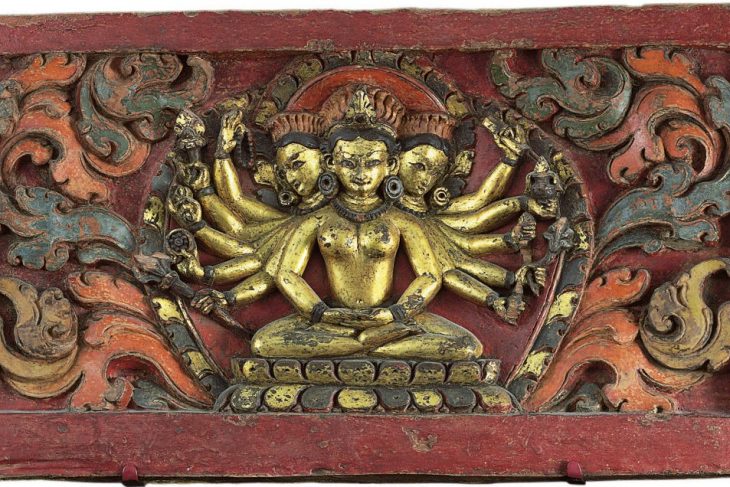 A gilt and polychromed wood panel