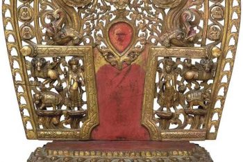 A gilt and polychromed wooden torana and pedestal