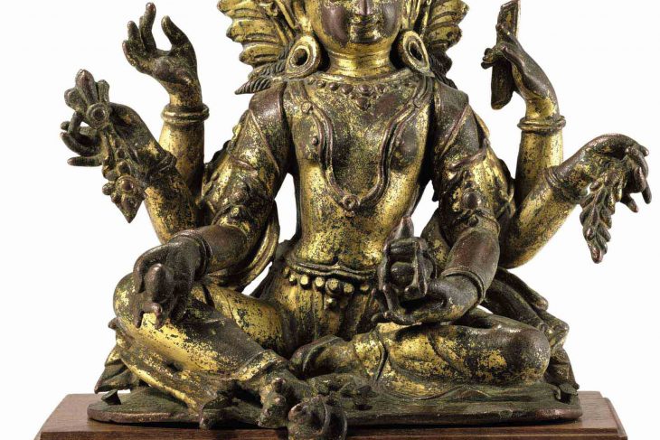A gilt bronze figure of Vasudhara