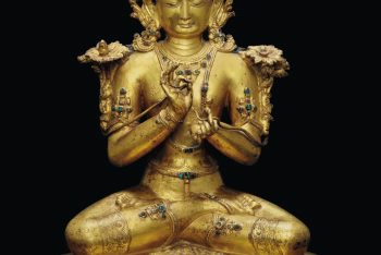 A gilt bronze figure of Maitreya