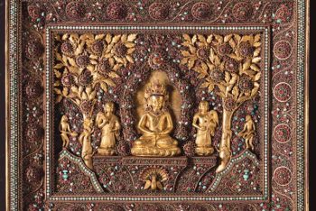 Temple plaque with seated Buddha