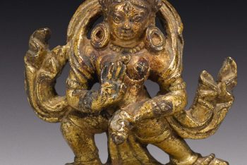 A COPPER ALLOY FIGURE OF AN OFFERING GODDESS
