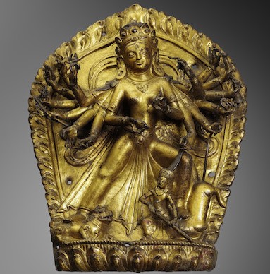 A GILT COPPER ALLOY REPOUSSÉ PLAQUE OF DURGA MAHISHASURAMARDINI