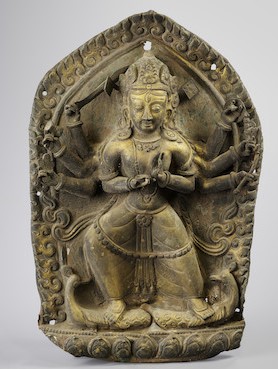 A GILT COPPER ALLOY REPOUSSÉ PANEL OF KUMARA OR KUMARI