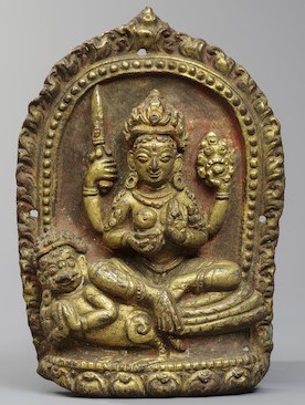 A GILT COPPER ALLOY REPOUSSÉ PLAQUE OF VAISHNAVI