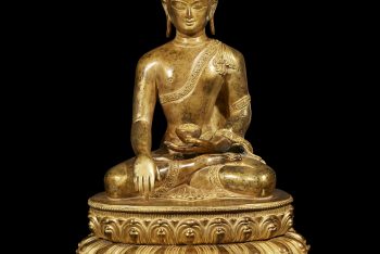 An exquisitely cast and chased Nepalese gilt bronze figure of Buddha