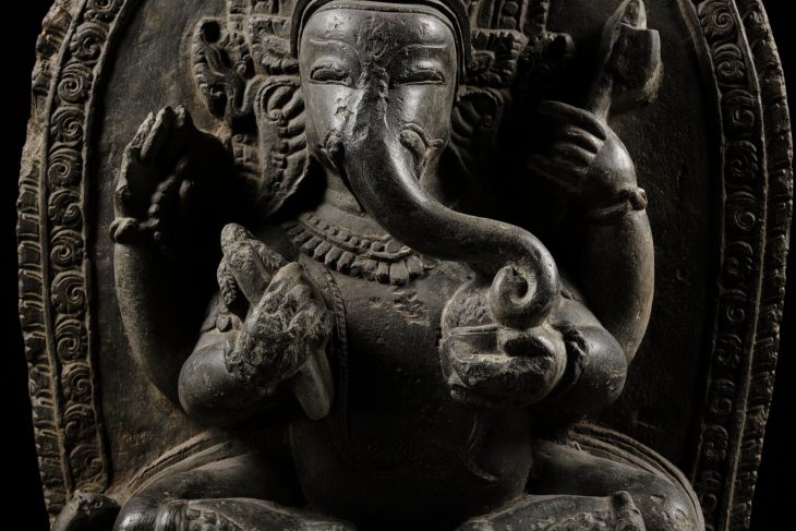 A BLACK STONE STELE OF GANESHA