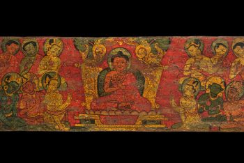 A PAINTED WOOD MANUSCRIPT COVER