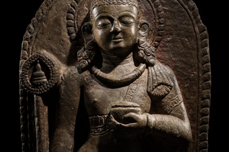 A LIMESTONE STELE OF SARIPUTRA